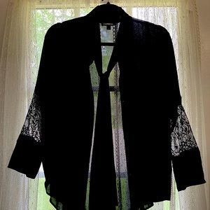 Black Express button down blouse size S. Some lace on sleeve.